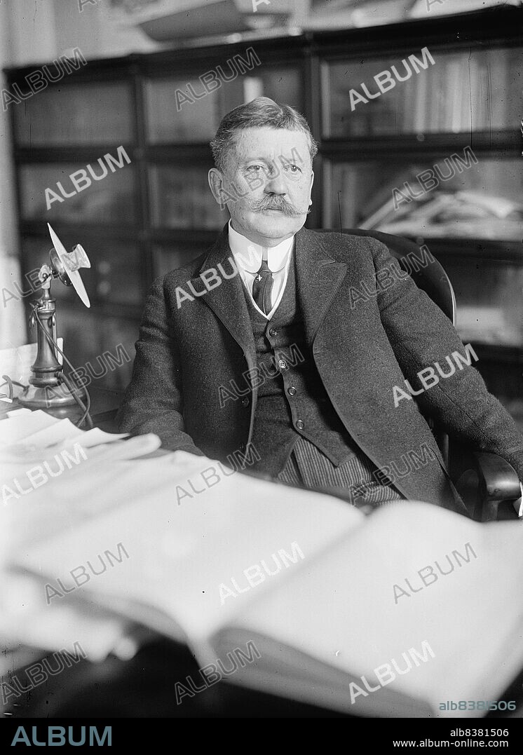 HARRIS & EWING. Edward B. Moore, Commissioner of Patents - At Desk, 1912. [Edward Bruce Moore, US Patent Office].