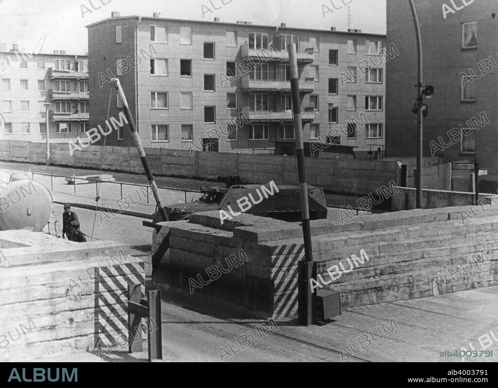 Checkpoint between East and West Berlin, Heinrich Heine Strasse, Berlin, Germany. One of the crossing points on the Berlin Wall. The Communist East German authorities erected the Berlin Wall in 1961, separating their zone of the city from West Berlin and preventing movement between the two. According to official figures 133 people were killed by the East Germans trying to cross the wall from east to west before it was dismantled in 1989, but unofficial estimates suggest the figure was at least 200. The dismantling of the wall symbolised the end of the Cold War and paved the way for the reunification of Germany.