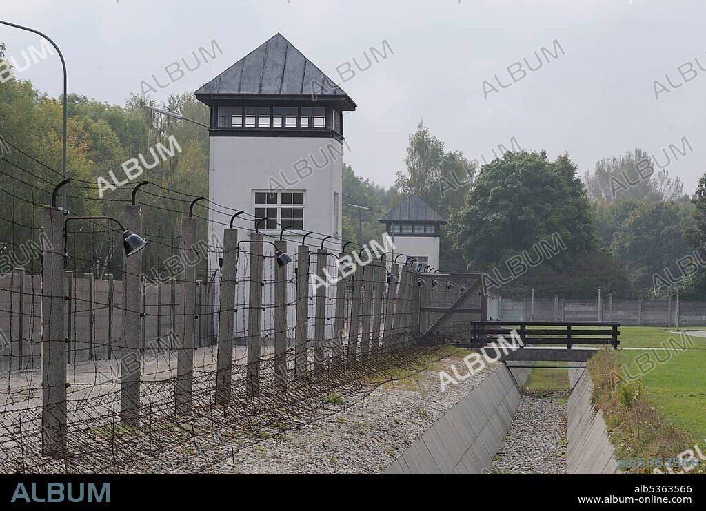 Camp fence and watchtower, former concentration camp Dachau, memorial site, Munich, Bavaria, Germany, Europe.