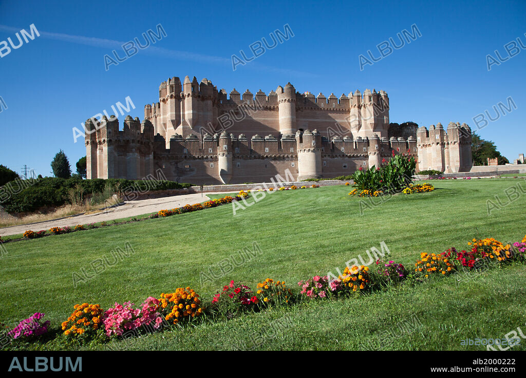 Spain, Castile and Leon, Segovia, Coca, Coca Castle (Castillo de Coca). The castle was erected by Moorish builders in the mid-15th century for Bishop Alfonso Fonseca, archbishop of Seville and lord of Coca and Alaejos. It is a mixture of Moorish and military architecture.