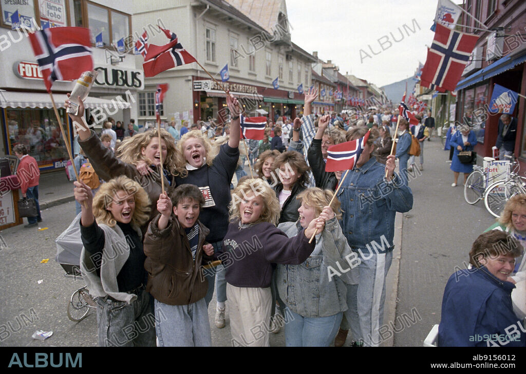 Oslo 1988-09-15:-and the winner is Lillehammer! The 1994 Winter Olympics, Lillehammer, Norway. Cheers and joy in Lillehammer's streets the same day it became clear that the city had received the Winter Olympics for 1994. Norwegian flags. Photo: Eystein Hanssen.