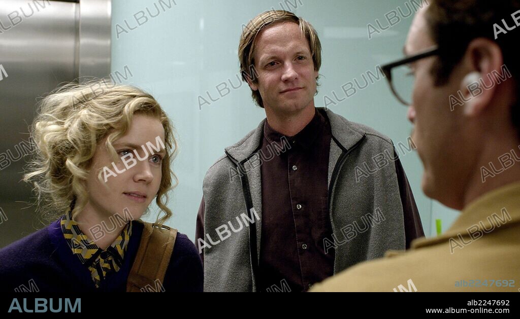 AMY ADAMS, JOAQUIN PHOENIX and MATT LETSCHER in HER, 2013, directed by SPIKE JONZE. Copyright ANNAPURNA PICTURES.