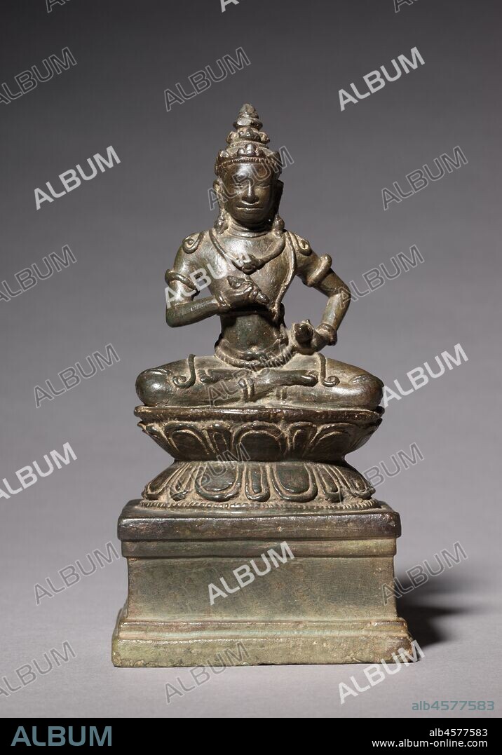 Vajrasattva, 1100s-1200s. Vajrasattva is a Buddhist being of enlightenment who holds the  vajra , or thunderbolt, in his right hand and a bell in his left. The vajra and bell are the basic implements used in tantric rituals that were popular under Jayavarman VII and practiced at Banteay Chhmar.   Tantra is a form of Buddhism that makes use of rituals and mantras to aid practitioners in reaching their goals quickly, as though with the speed of lightning. Tantric texts and rituals were used frequently in  Cambodia, from the 900s onward, but they were especially prominent under Jayavarman VII. This form of Buddhism appears to have been supplanted by other forms after the 1400s.   Small bronze images of Vajrasattva may have been brought out from a temple treasury during the performance of Buddhist rituals that followed the instructions in a Sanskrit text, brought to Cambodia from India, called the  Hevajra-tantra . In that text Vajrasattva manifests at key moments in the rituals.
