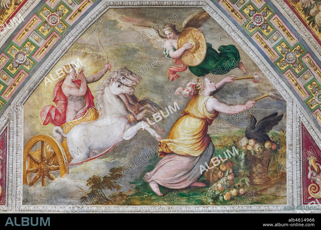 Ferrara, the Castello Estense (the Estense Castle), also known as Castle of St. Michael: detail of the ceiling of the Chamber of Dawn: "Dawn" with the chariot of the Sun, by Bastianino. The Chamber, former Ercole II's private room, was known in 1600 as the mirror chamber. It gives the name to the whole representation apartment that Alfonso II wanted. The vault scenes are thought to be the allegory of human life.