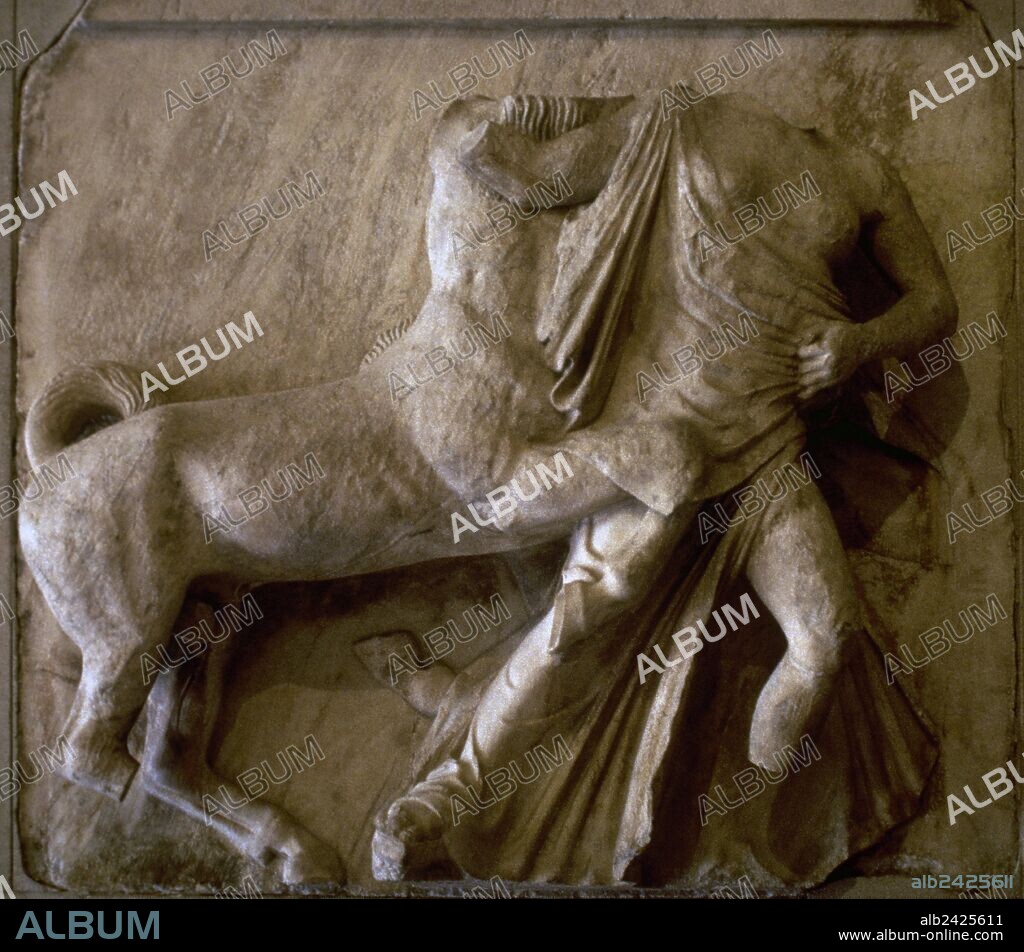 Greece. Metope of the Parthenon (5th century BC). Scene from the Centauromachy. Mythical centaurs fought with the Lapiths. The combat took place during the wedding celebrations of Pirithous, King of the Lapiths, at which the drunken centaurs attempted to abduct the wives of their hosts. This relief depicts the abduction of a Lapith woman by one of the centaurs. By Phidias (490-432 BC). From Athens. Louvre Museum. Paris, France.