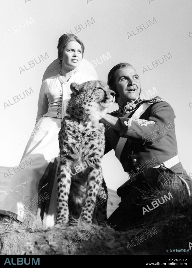 STANLEY BAKER und ULLA JACOBSSON in ZULU, 1964, unter der Regie von CY ENDFIELD. Copyright PARAMOUNT PICTURES.