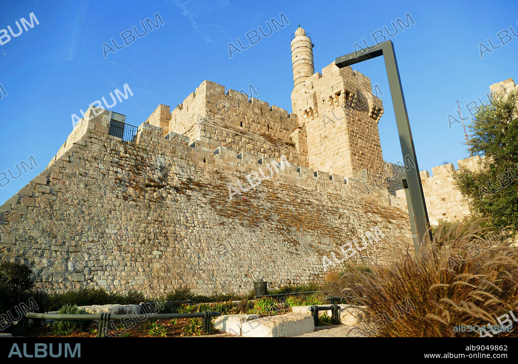 The Tower of David (Migdal David, Burj Daud), known as the Jerusalem Citadel, is an ancient citadel located near the Jaffa Gate entrance to western edge of the Old City of Jerusalem. The citadel that stands today dates to the Mamluk and Ottoman periods. It was built on the site of an earlier ancient fortification of the Hasmonean, Herodian-era, Byzantine and Early Muslim periods, after being destroyed repeatedly during the last decades of Crusader presence in the Holy Land by Ayyubid and Mamluk rulers.