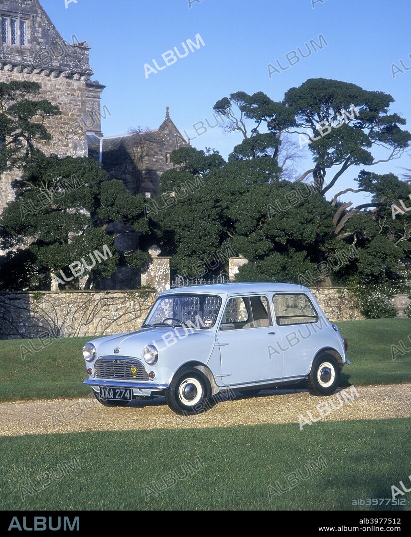 1959 Austin Mini Seven. In 1957 BMC commissioned Alec Issigonis to design a new small car, following his success with the Morris Minor. Popularly known as the Mini, this innovative model popularised many design features still common today. Driving the front wheels, its transverse mounted engine, with the gearbox beneath, removed the space-consuming transmission tunnel. Styling was minimalist, in sharp contrast to the transatlantic fins and chrome of the fifties.