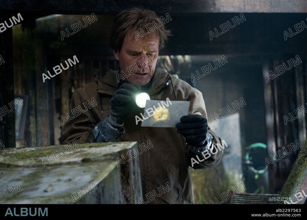 BRYAN CRANSTON in GODZILLA, 2014, directed by GARETH EDWARDS. Copyright WARNER BROS.