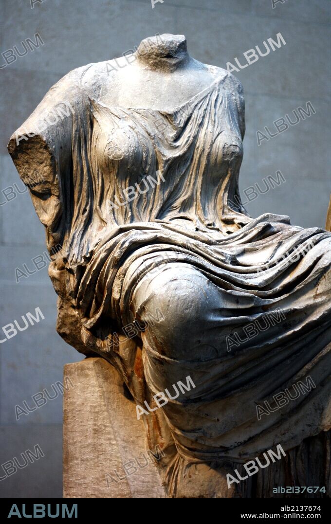 Statue of a seated woman about to rise. Greek. Possibly Hestia, Goddess of the hearth. From the East Pediment of the Parthenon, Athens. (Photo by: Universal History Archive/UIG via Getty Images).