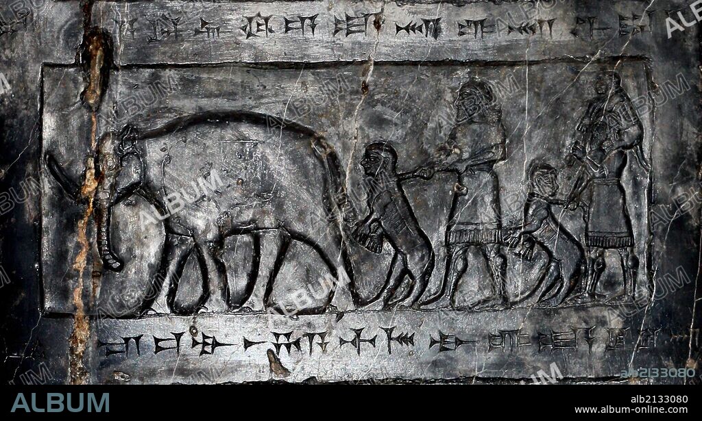The Black Obelisk of Shalmaneser III (858-824 BC). Assyrian, from Nimrud. Made of fine-grain Black limestone streaked with white. It records the king's campaigns, and tributes given to him. (Photo by: Universal History Archive/UIG via Getty Images).