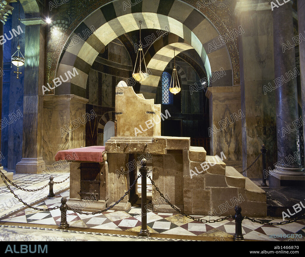 Throne of Charlemagne. C.800. Marble. West side of the upper gallery. Palatine Chapel. Aachen Cathedral. Germany.