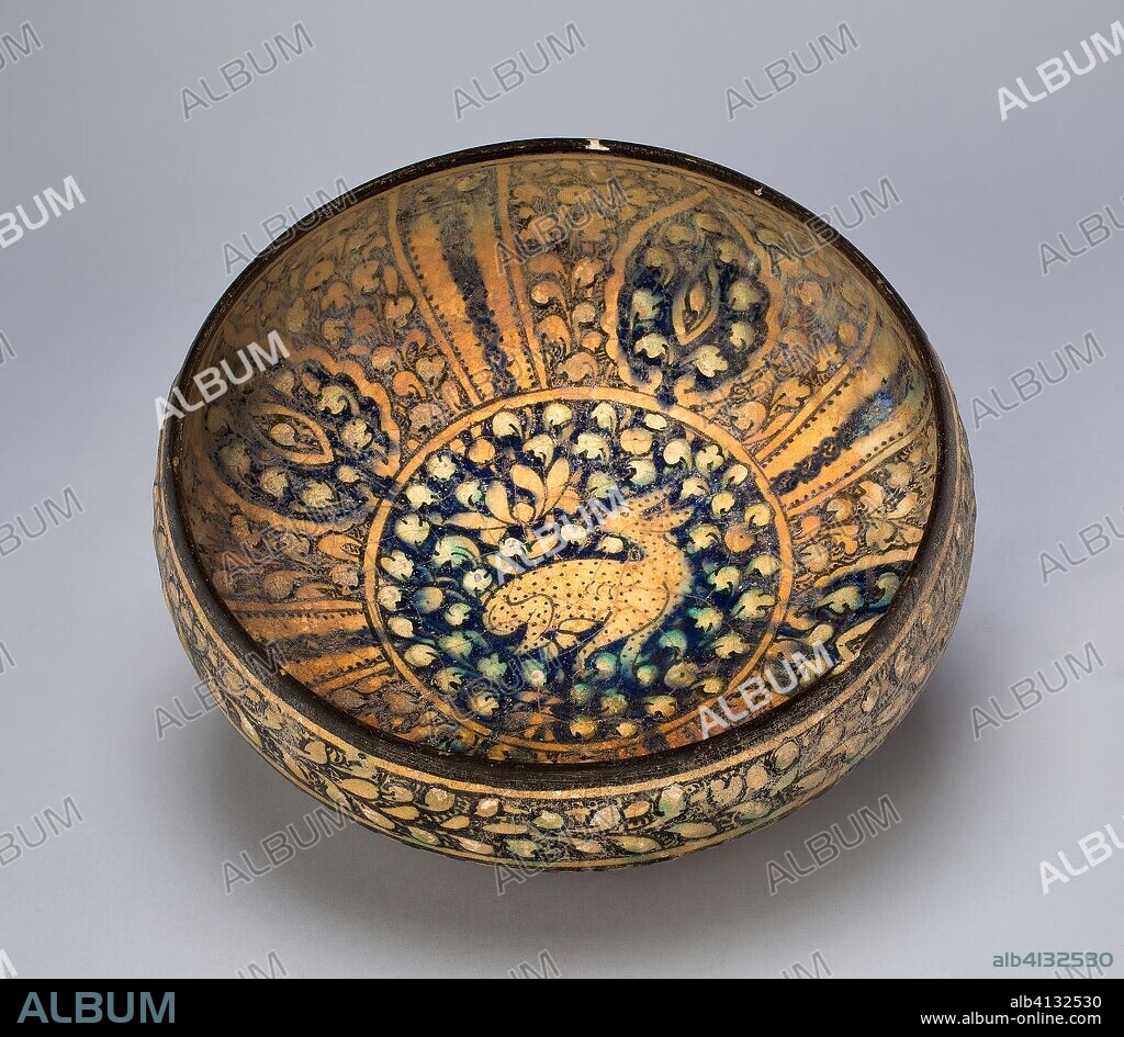 ISLAMIC. Bowl. Iran; probably Kashan. Date: 1260-1400. Dimensions: . Fritware, underglaze-painted decoration. Origin: Sultanabad.