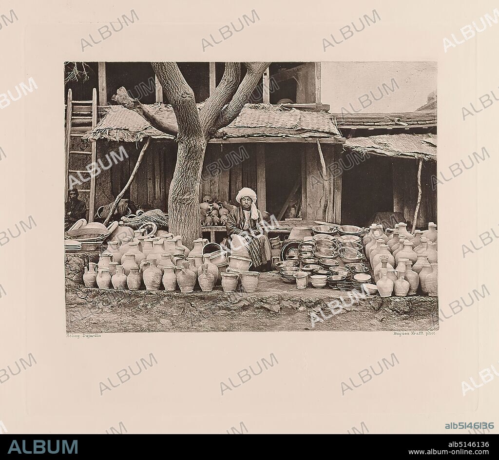Hachette & Cie, Hugues Krafft, Dujardin, Dans les bazars: l'étalage d'un potier, from the book A travers le Turkestan Russe, paper, heliogravure, Image size: Height: 12,30 cm; Width: 17,00 cm, travel photography, portrait photography, street hawkers, craftsmen.
