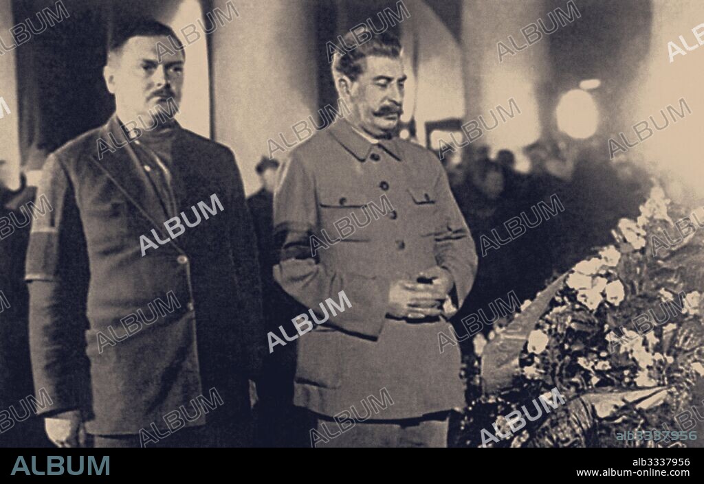 ANONYMOUS. Joseph Stalin and Andrei Zhdanov before the Sergei Kirov's coffin.