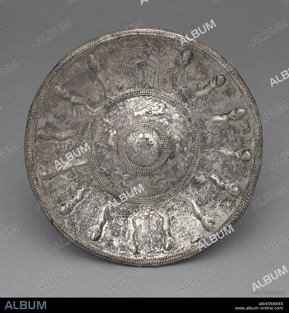 Dish with Tambourine Players, 700-600 BC. The Phoenicians lived on the coast of what is now Israel and Lebanon from about 1200 to 700 BC. Skilled sailors, traders, and craftsmen, they are best remembered today for having developed the basis of the Western alphabet. Their travels took them to Iran, where they bought silver, and to Egypt, where they bought ivory and acquired a taste for Egyptian artistic motifs. For example, many of their works of art include sphinxes and lotuses.