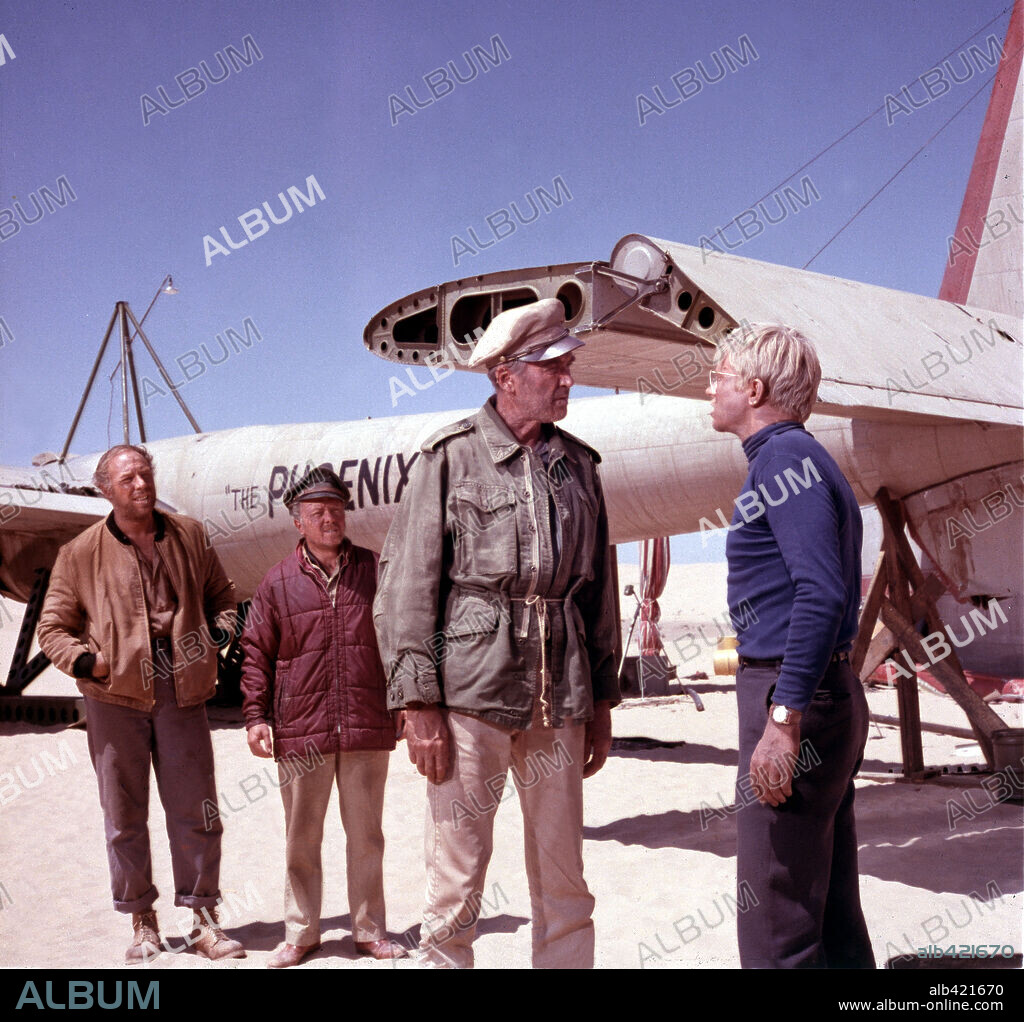 GEORGE KENNEDY, HARDY KRUGER, JAMES STEWART and RICHARD ATTENBOROUGH in THE FLIGHT OF THE PHOENIX, 1965, directed by ROBERT ALDRICH. Copyright 20TH CENTURY FOX.