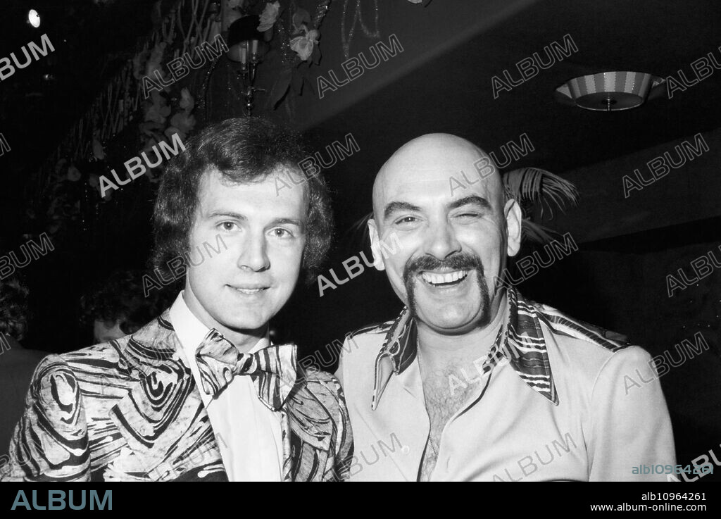 German football player Franz Beckenbauer (left) at the Deutscher Filmball on March 31st 1975 at Munich, Germany 1970s.
