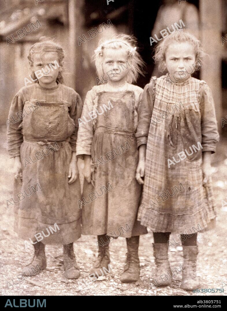 Entitled: "Josie, six year old, Bertha, six years old, Sophie, 10 years old, all shuck regularly. Maggioni Canning Co. Location: Port Royal, South Carolina." Child labor refers to the employment of children in any work that deprives children of their childhood, interferes with their ability to attend regular school, and that is mentally, physically, socially or morally dangerous and harmful. According to the 1900 US Census about 1 in every 6 Children between the ages of five and ten were engaged in "gainful occupations" in the United States. This trend alarmed Americans who, while supporting the traditional role of children in agriculture, found the idea of American youth laboring for meager wages in industrial factories appalling. From 1909 to 1921 the NCLC (National Child Labor Committee) capitalized on this moral outrage by making it the focal point of the NCLC campaign against child labor. They hired Lewis Hine, a teacher and professional photographer trained in sociology, to document child labor in American industry. Over the next ten years Hine would publish thousands of photographs designed to pull at the nation's heartstrings. Photographed by Lewis Hine, February 1911.
