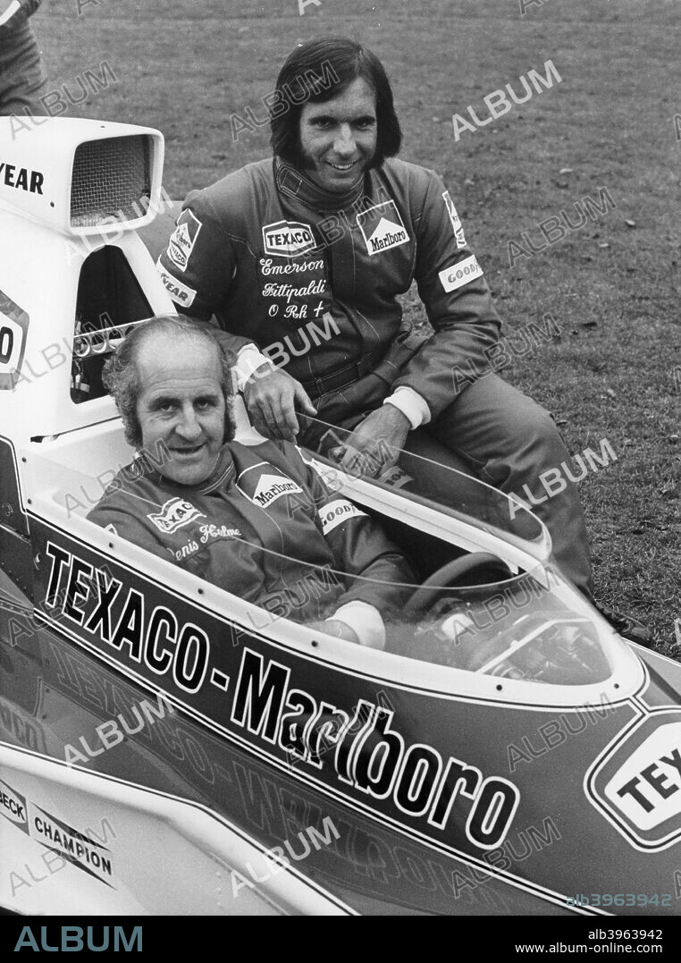 Denny Hulme and Emerson Fittipaldi, 1974. Hulme, (in the McLaren M23), and Fittipaldi in their Texaco-Marlboro Mclaren racing overalls. Fittipaldi won his second World Drivers' Championship with Mclaren in 1974, winning three races in the process. His team-mate Hulme came 7th in the Championship, with a victory in the Argentinian Grand Prix.