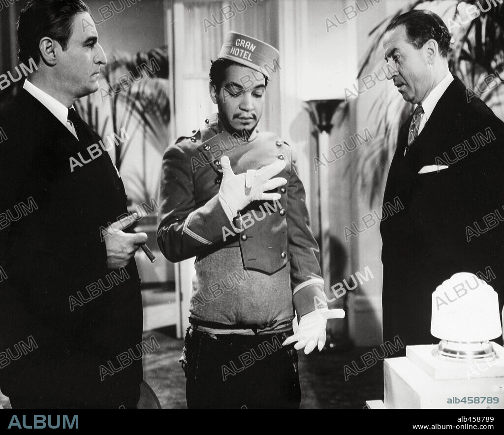 CANTINFLAS in GRAN HOTEL, 1944, directed by MIGUEL M. DELGADO. Copyright POSA FILMS, S.A.