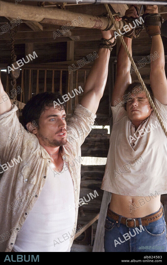 MATT BOMER and TAYLOR HANDLEY in TEXAS CHAINSAW MASSACRE, THE: THE BEGINNING, 2006, directed by JONATHAN LIEBESMAN. Copyright NEW LINE CINEMA / REDIN, VAN.