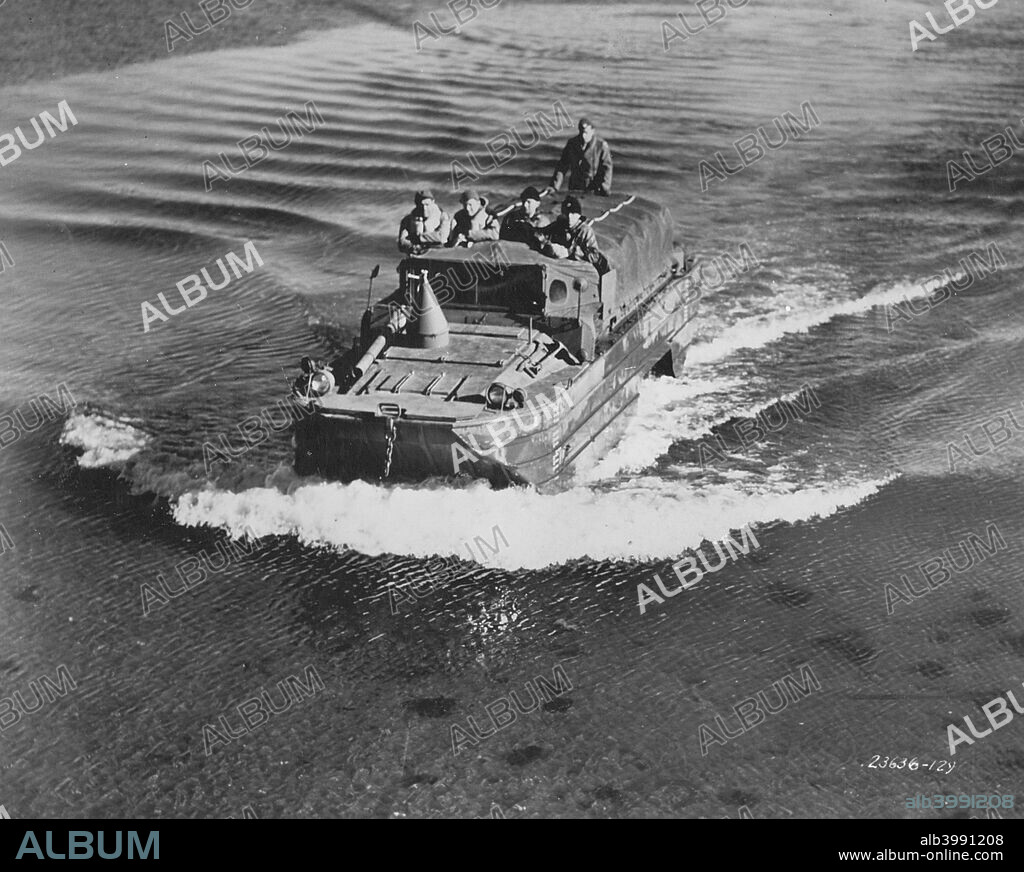 GMC  DUKW amphibious vehicle, Fort Sheridan, Illinois, USA, 1940s. Designed in 1942, these vehicles were used to transport troops ashore in amphibious assaults in the Mediterranean and Pacific as well as the Normandy Landings. They inevitably became known as 'duck boats', but the name was not a military pun, the letters standing for the following: D - designed in 1942; U - amphibious 2 1/2 ton truck; K - front wheel drive; W - rear wheel drive.