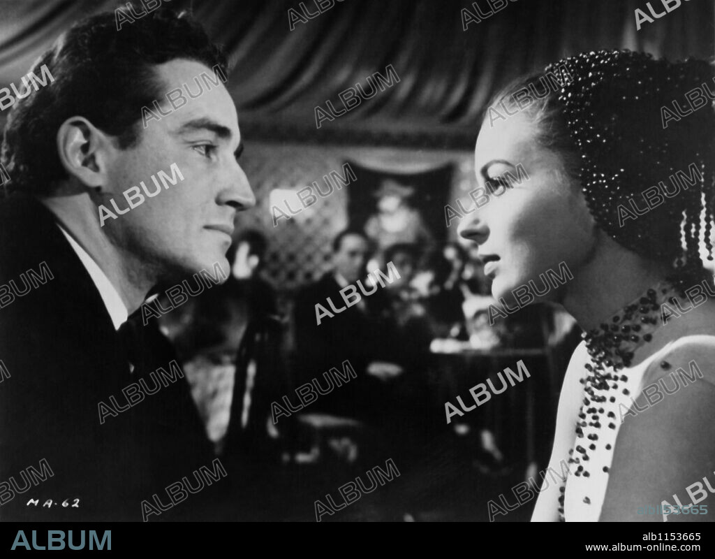 SILVANA MANGANO and VITTORIO GASSMAN in MAMBO, 1954, directed by ROBERT ROSSEN. Copyright PARAMOUNT PICTURES.
