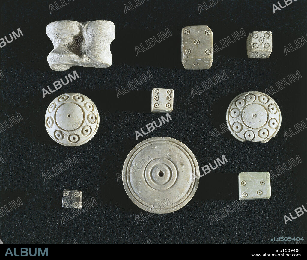 Roman civilization, 1st-3rd century A.D. Game objects made from ivory: dice, knucklebones (astragaloi) and counters. From Volubilis (Morocco).