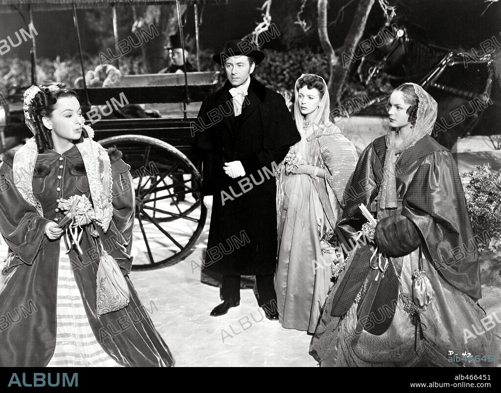IDA LUPINO, NANCY COLEMAN, OLIVIA DE HAVILLAND and PAUL HENREID in DEVOTION, 1946, directed by CURTIS BERNHARDT. Copyright WARNER BROTHERS.