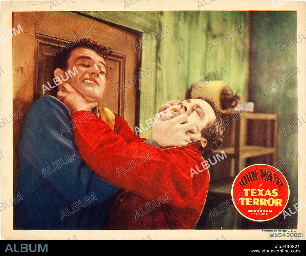 JOHN WAYNE in TEXAS TERROR (1935), directed by ROBERT N. BRADBURY. Copyright LONE STAR PRODUCTIONS/MONGRAM PICTURES.
