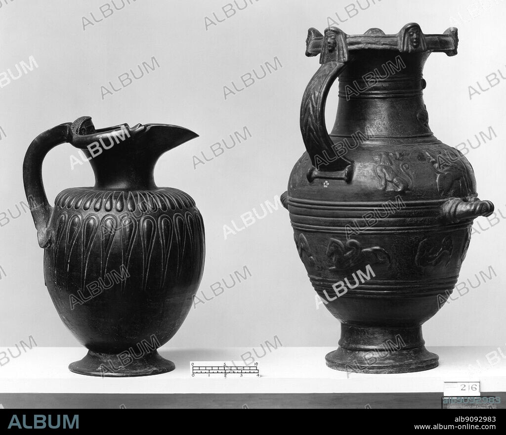 Eutruscan pottery - ornate black bucchero pottery commonly found in Etruscan tombs 6th century BC. Bucchero ['bukkero] (via ital. from port. bucáro "odorous clay") is a type of black pottery typical for the Etruscan civilization during the 1st millennium BC. Firing method turned the clay black, and the surface was shiny and metallic-looking because it was carefully polished before firing. ©TopFoto.