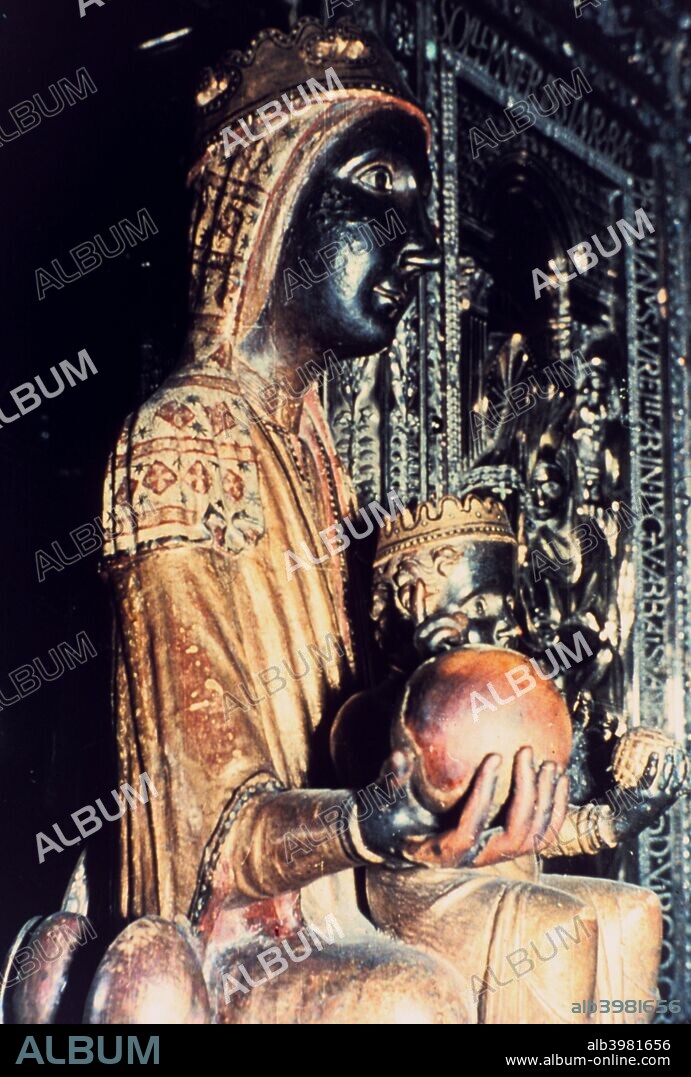 Virgin of Montserrat, Catalonia, Spain. This Black Madonna in the Benedictine Abbey of Montserrat is said to have been carved by St Luke. The Romanesque wooden statue was in fact made at the end of the 12th century. The colour on her face and hands is due to the darkening of the varnish over time.