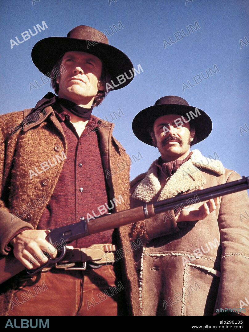 CLINT EASTWOOD and JOHN SAXON in JOE KIDD, 1972, directed by JOHN STURGES. Copyright UNIVERSAL PICTURES.