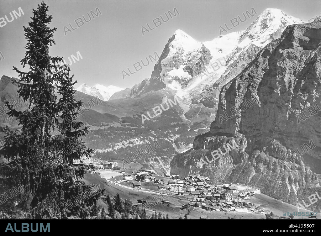 Magic lantern slide circa 1900.Victorian.The view to MÃ¼rren a traditional Walser mountain village in Bernese Oberland, Switzerland, at an elevation of 1,638m (5,374 ft.) above sea level and unreachable by public road. Tourism is popular through the summer and winter; the village features a view of the three towering mountains: Eiger, MÃ¶nch.