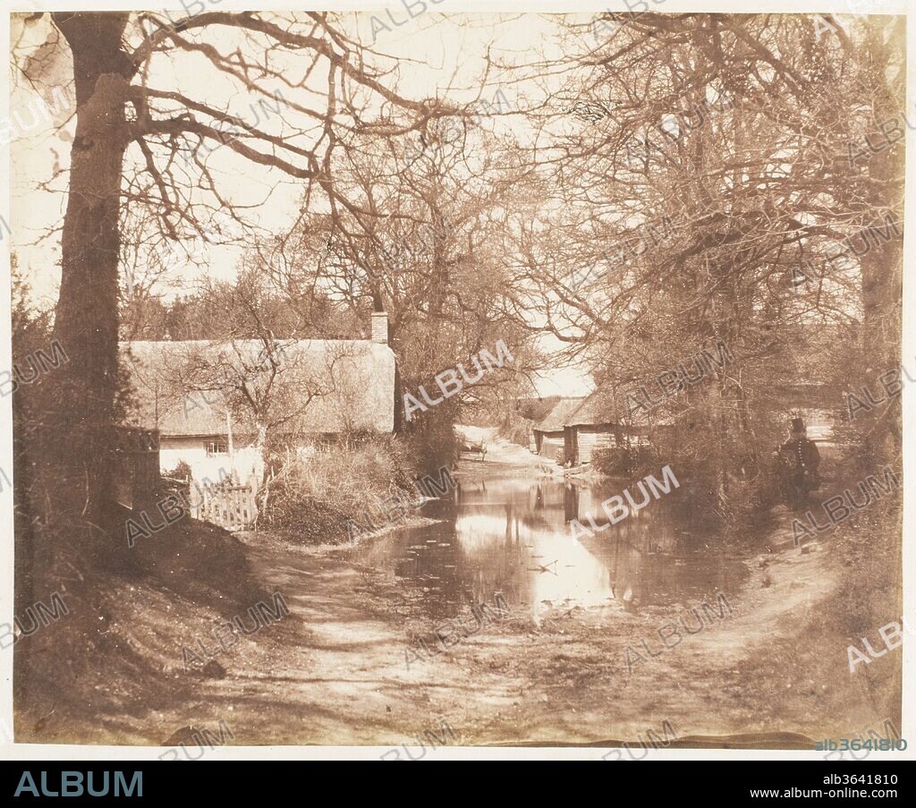 [View of a House in the Woods, with a Waterlogged Road]. Artist: John Dillwyn Llewelyn (British, Swansea, Wales 1810-1882 Swansea, Wales). Dimensions: Image: 18.5 × 22.3 cm (7 5/16 × 8 3/4 in.). Date: 1853-56.
