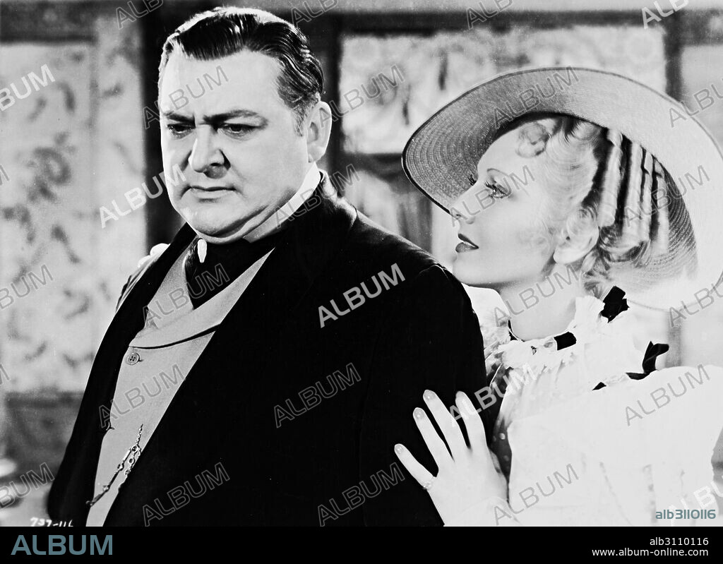 EDWARD ARNOLD and JEAN ARTHUR in DIAMOND JIM, 1935, directed by A. EDWARD SUTHERLAND. Copyright UNIVERSAL PICTURES.