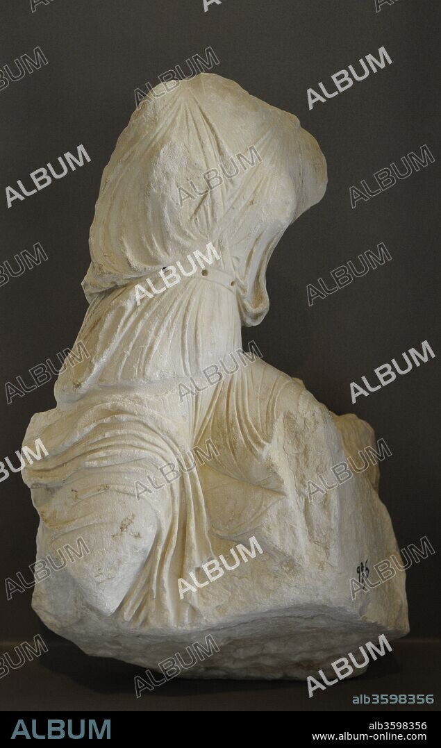 Greek art. The parapet of the Athena Nike temple. Nike sacrificing a bull. North part of the West parapet. 5th century BC. Acropolis Museum. Athens. Greece.
