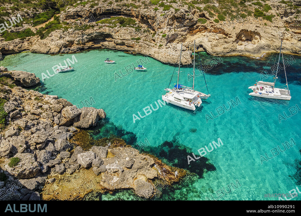 Moored yachts, Cala Marmols, Ses Salines, mallorca, balearic islands, spain, europe.
