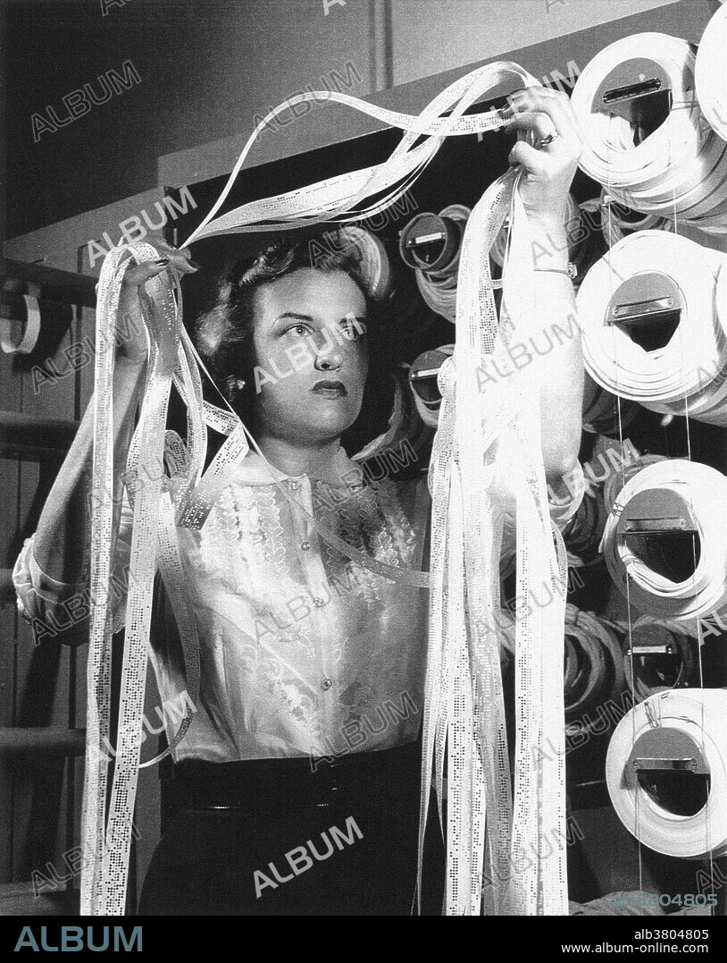 Doris Baron with Manometer tape. Before the development of electronic computers, the term "computer" referred to people, not machines. It was a job title, designating someone who performed mathematical equations and calculations by hand. The majority of computing work involved three components: reading film, running calculations, and plotting data. During wind tunnel tests, manometer boards measured pressure changes using liquid-filled tubes. Computers "read" photographic films of the manometer readings, and recorded the data on worksheets. Working one on one for an engineer, or collectively in a computing section, computers then ran different types of calculations to analyze the data, and plotted the results on graph paper. All this work was done by hand, using slide rules, curves, magnifying glasses and basic calculating machines. Once completed, the calculations, graphs and other information were checked for accuracy and sent back to the engineers to design the next tests.