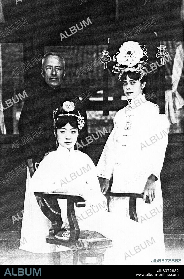Gobulo Wan Rong ('Beautiful Countenance') was the daughter of Rong Yuan, the Minister of Domestic Affairs of the Qing Government and head of one of Manchuria's most prominent, richest families. At the age of 17, Wan Rong was selected from a series of photographs presented to the Xuan Tong Emperor (Puyi). The wedding took place when Puyi reached the age of 16. Wan Rong was the last Empress Consort of the Qing Dynasty in China, and later Empress of Manchukuo (also known as the Manchurian Empire). Empress Wan Rong died of malnutrition and opium addiction in prison in Jilin.<br/><br/>. Sir Reginald Fleming Johnston, KCMG, CBE (13 October 18746 March 1938) was a Scottish academic and diplomat who served as the tutor and advisor to Puyi, the last Emperor of China and as the last colonial governor of Weihaiwei.<br/><br/>. Isabel Ingram (Mayer) (19021988) was an American tutor of Wan Rong, Empress and wife of the last emperor of China.