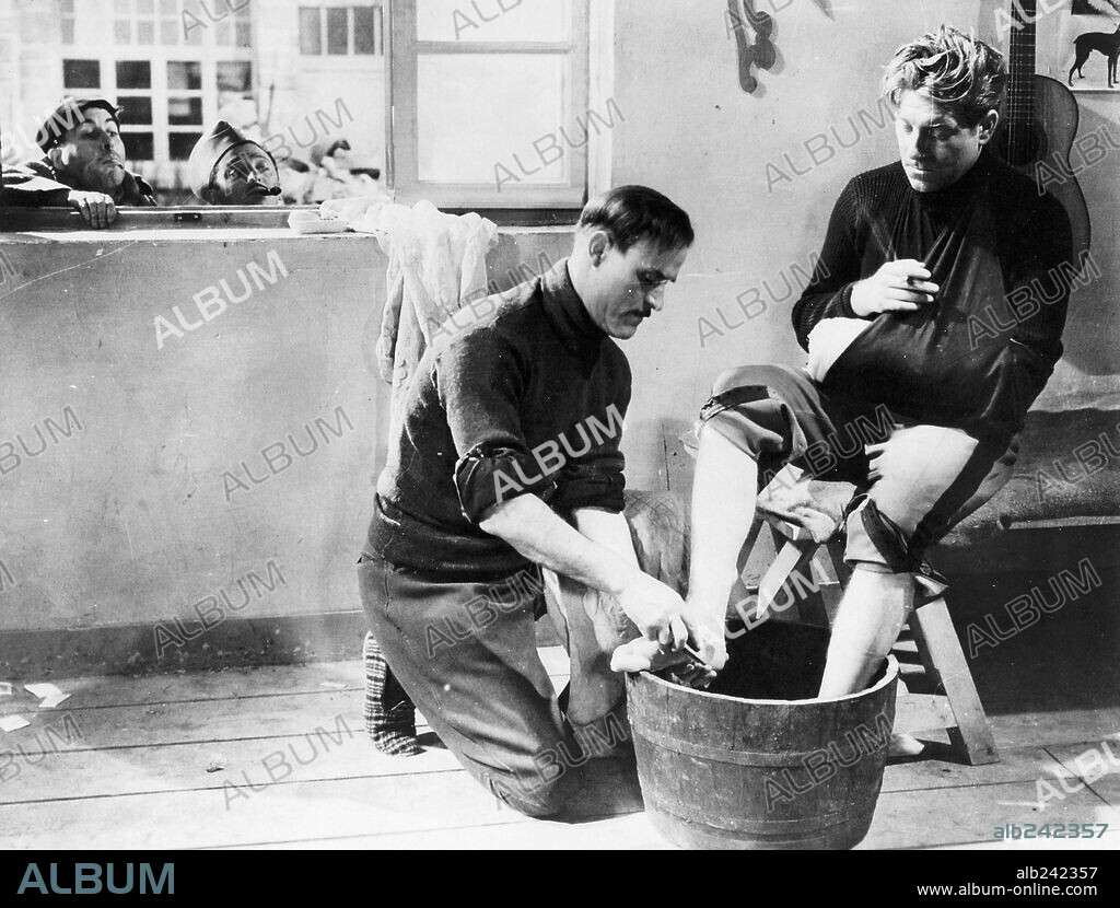 GASTON MODOT and JEAN GABIN in THE GRAND ILLUSION, 1937 (LA GRANDE ILLUSION), directed by JEAN RENOIR. Copyright REALISATIONS D'ART CINEMATOGRAPHIQUE.