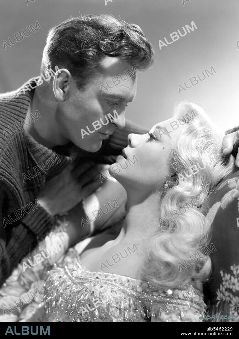 DONALD SINDEN and GLYNIS JOHNS in MAD ABOUT MEN, 1954, directed by RALPH THOMAS. Copyright GENERAL FILM DISTRIBUTORS.