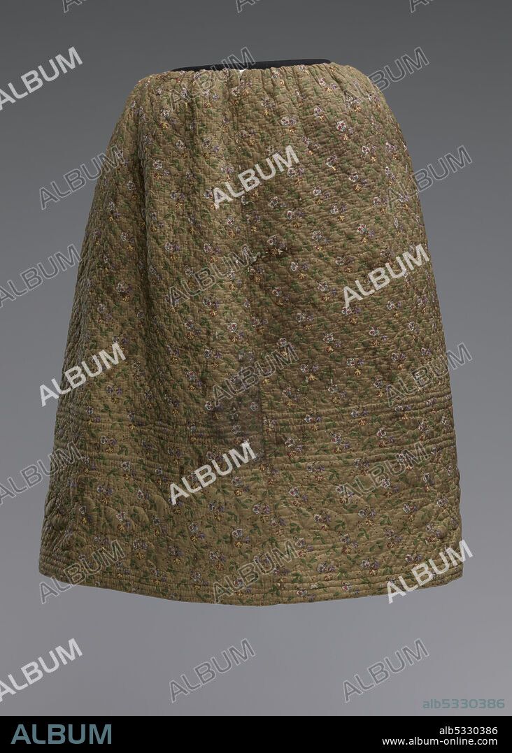 This quilted petticoat may have been made from a repurposed wholecloth bedcover or refashioned from a once larger skirt. The front of the textile is faced with a small-scale printed floral vine design in white, yellow, purple, and red blossoms with green leaves on a light brown ground. The back of the textile is faced with an orange striped cotton. A layer of cotton batting was quilted between the front and back facing fabrics. It was hand quilted with off-white cotton thread in an offset grid pattern with a leafy vine border design. The floral printed fabric was turned and hand stitched to the back fabric as binding. The fabrics and quilted motifs indicate it was probably made in the 1830s or 1840s. The fabric may have been imported from France.
