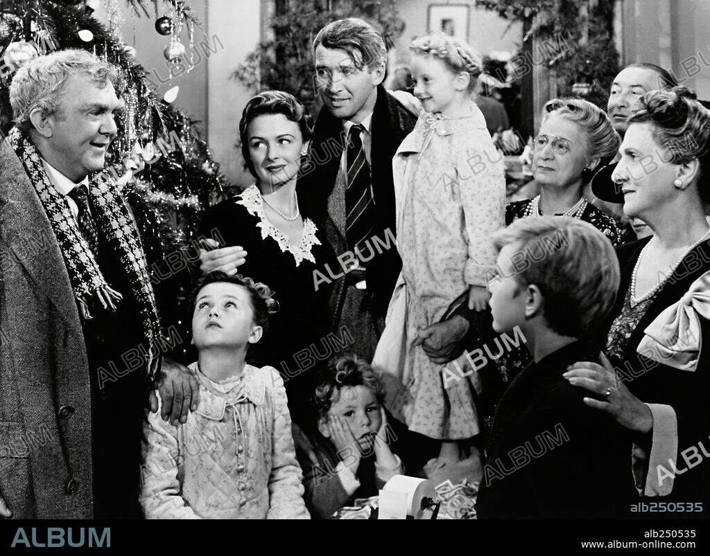 BEULAH BONDI, DONNA REED, JAMES STEWART and THOMAS MITCHELL in IT'S A WONDERFUL LIFE, 1946, directed by FRANK CAPRA. Copyright RKO.