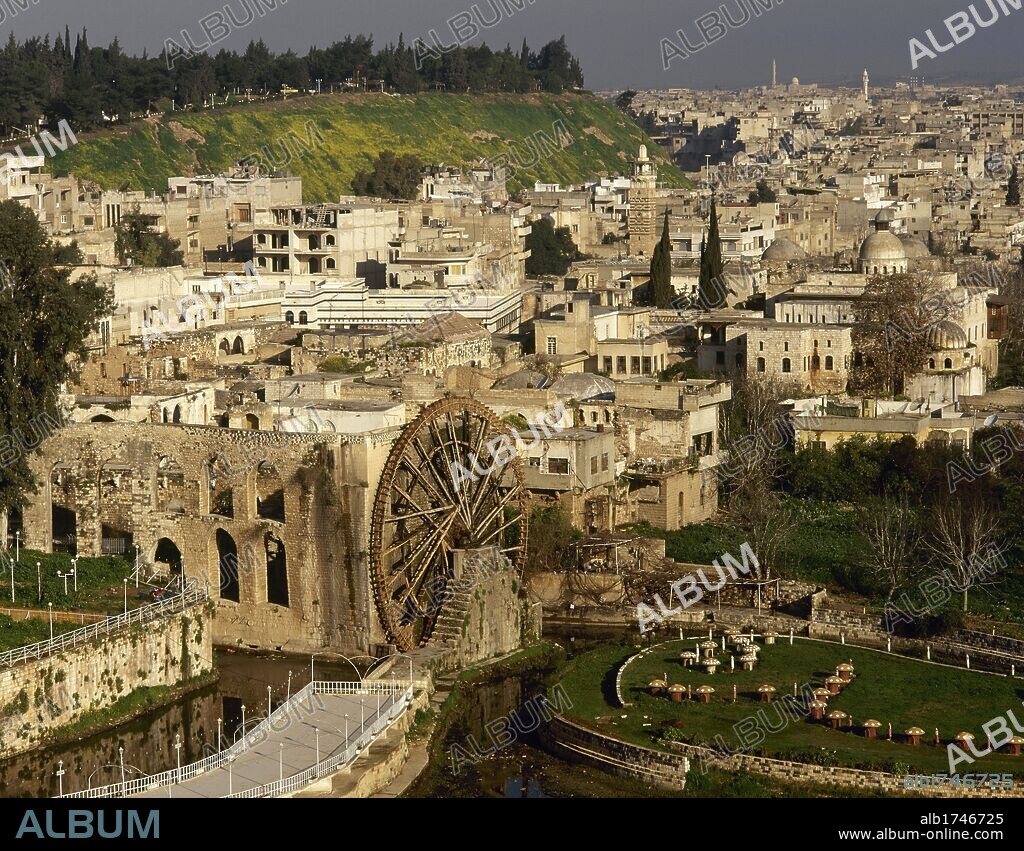 Syria. Hama. General view and the noria in the Orontes river.