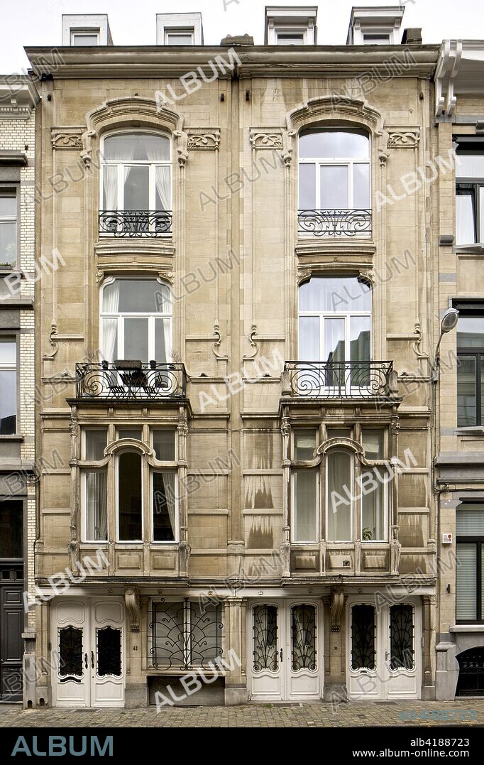 39 & 41 Rue De Magistrat,  Ixelles, Brussels, Belgium  c2014-2017. Designed by Albert Jeannin: 1904. Mansion house with elevation of four levels in white stone.