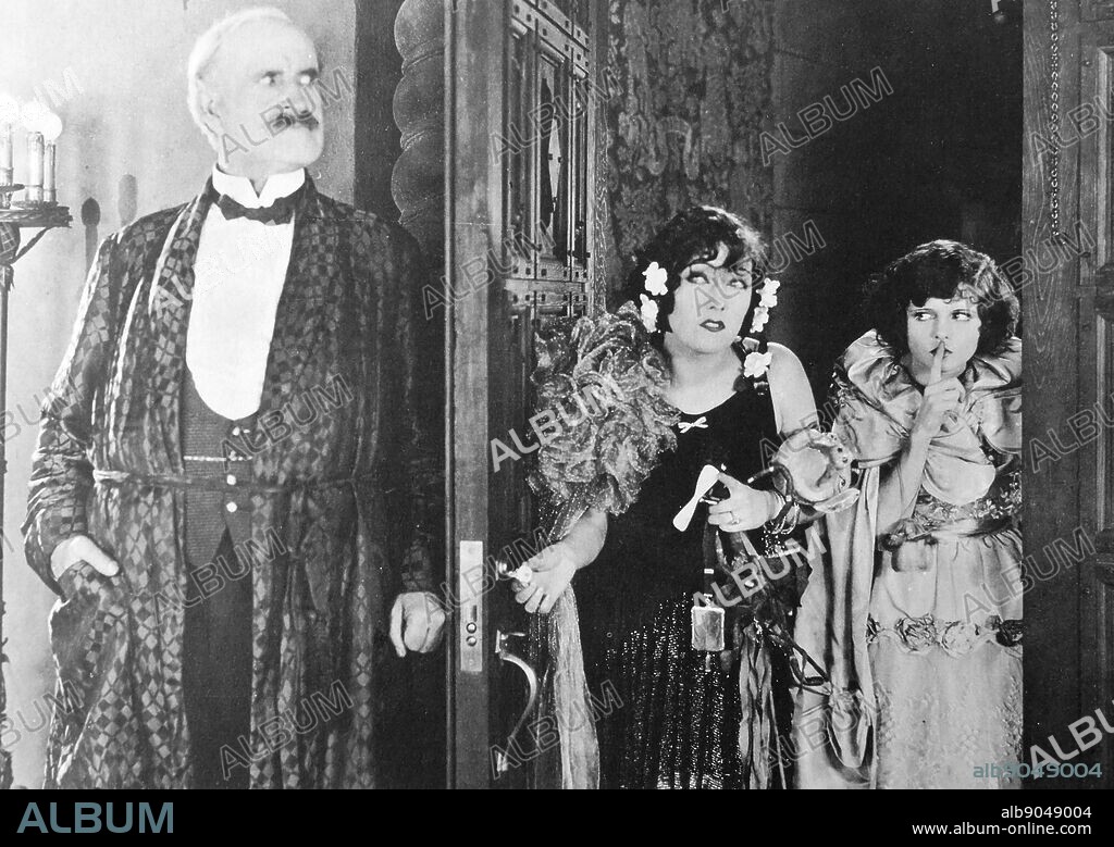 Gloria Swanson in Prodigal Daughters. 1923 The studio caption says 'J.D. catches his daughters in the act of returning from a ball after midnight'.