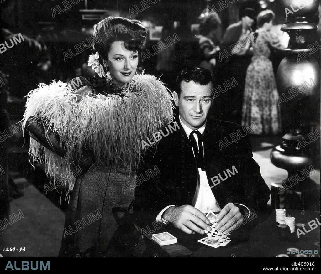 JOHN WAYNE in FLAME OF BARBARY COAST, 1945, directed by JOSEPH KANE. Copyright REPUBLIC PICTURES.