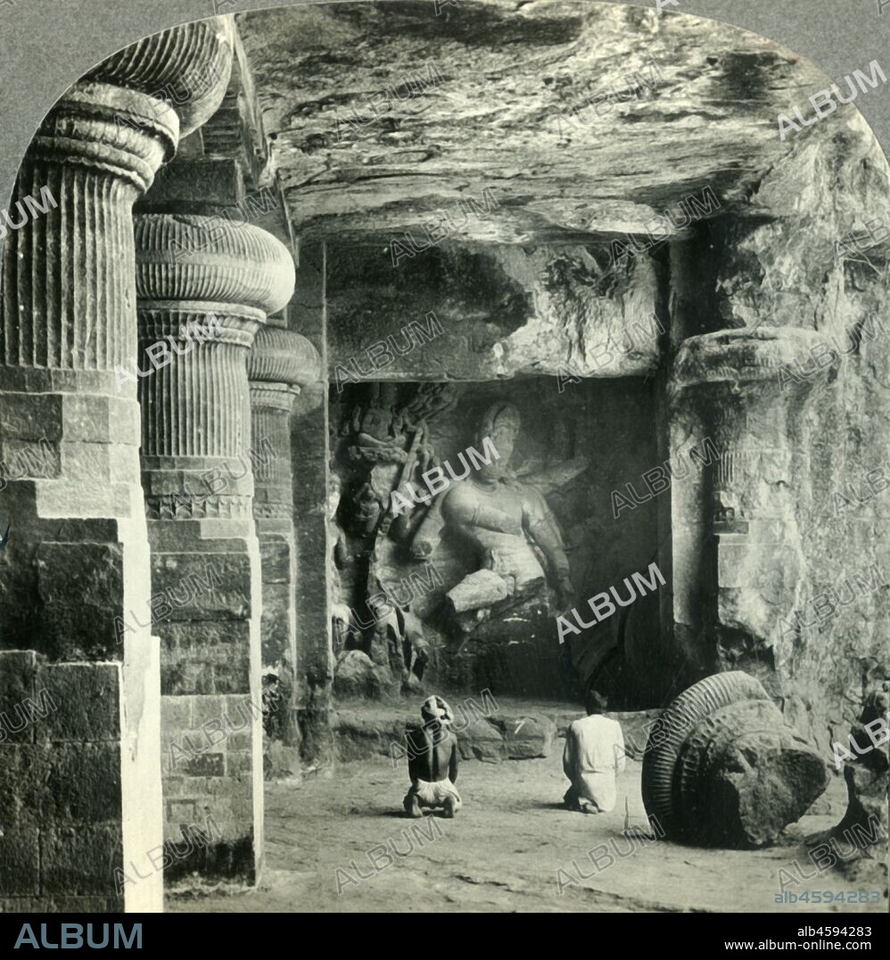 'Drunken Dance of the Eight-armed Divinity, Siva - Rock-hewn Temple at Elephanta, India', c1930s. Rock cut stone sculptures at Elephanta, a UNESCO World Heritage Site in Mumbai Harbour believed to date back to the 2nd century BC. From "Tour of the World". [Keystone View Company, Meadville, Pa., New York, Chicago, London].